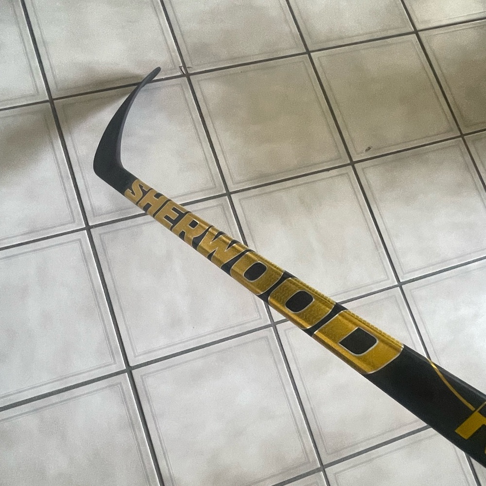 Sherwood Rekker Element NHL PROSTOCK Black and Gold Hockey Stick